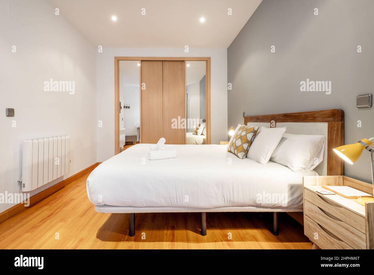 Bedroom with king size bed, wooden headboard, matching side tables and ...