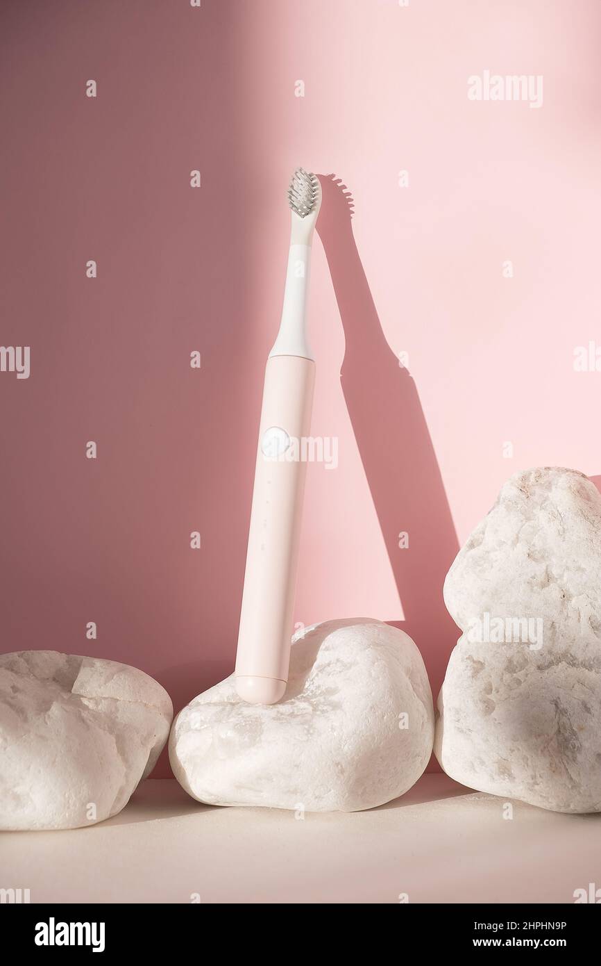 New modern ultrasonic toothbrush. Dental care supplies with white