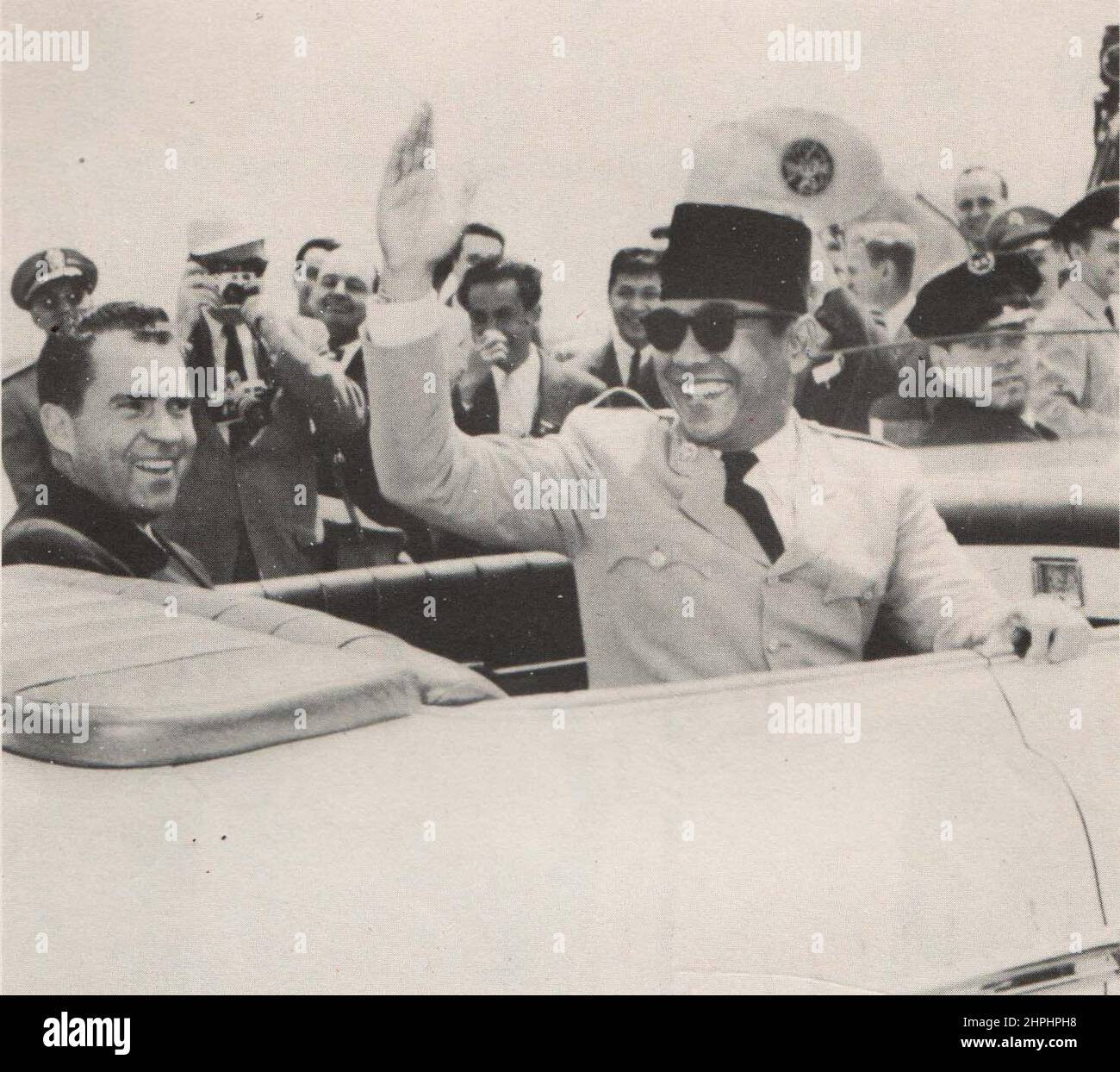 Indonesia Presidenrt Sukarno waving from car ca.  1956 Stock Photo