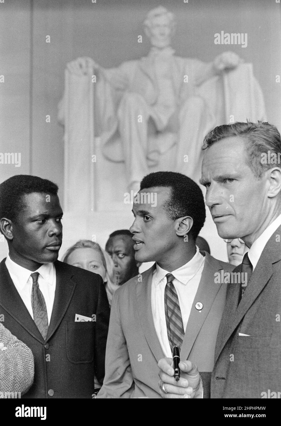 Sidney Poitier, Harry Belafonte, and Charlton Heston at the Civil Rights March  ca.  28 August 1963 Stock Photo