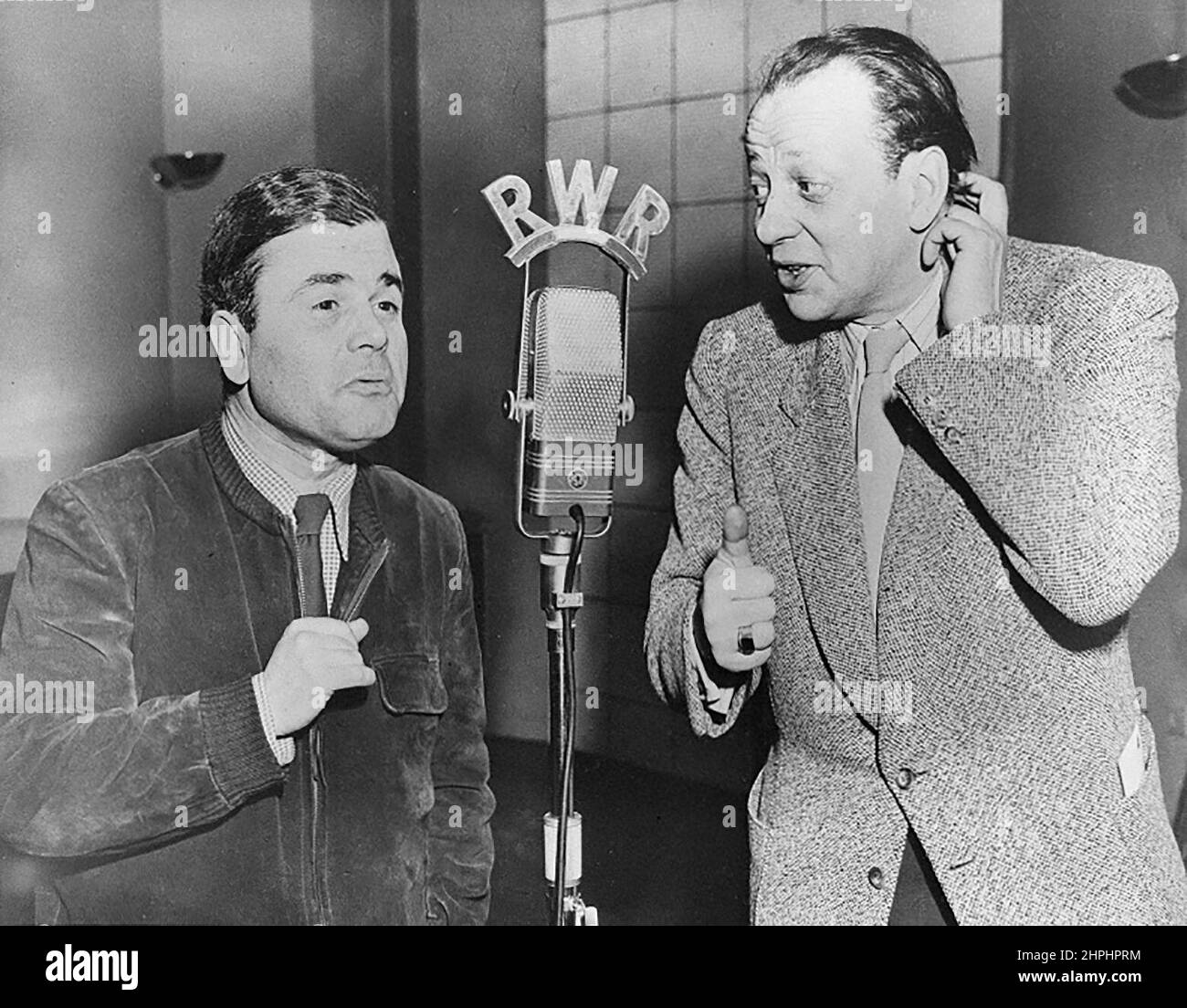 Franz Böheim and Ernst Waldbrunn in the Viennese studio of the station Rot-Weiss-Rot during the recording of the double conference 'Old But Good.' ca.  28 February 1952 Stock Photo
