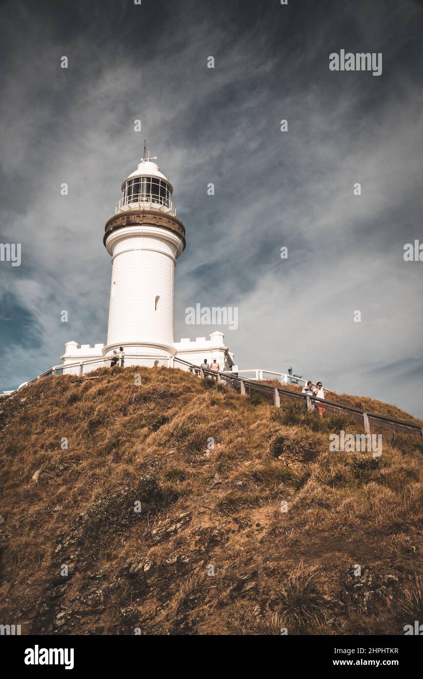 Vertical shot of a lighthouse on cloudy sky background in Australia ...