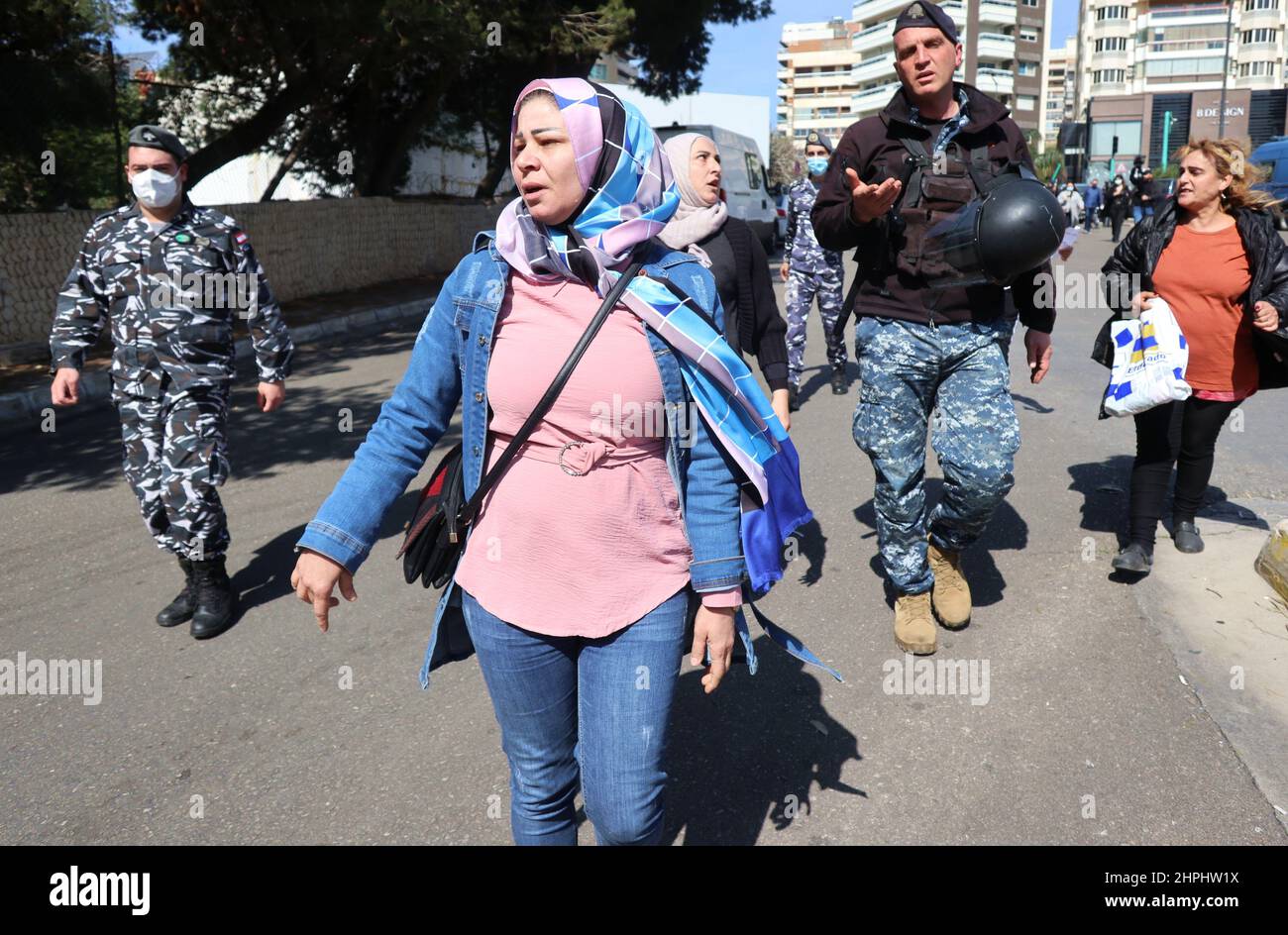 Mothers of students in Ukraine Universities, desperate for their children's life, try to enter the Unesco Palace to be heard by Parlamentarians, Beirut, Lebanon, February 21, 2022. They are members of the Lebanese Association of Parents of Students in Foreign Universities, who protest in front of Unesco Palace where the Lebanese Parliament run a plenary session. The families of students in Ukraine, worried for the incoming war, denounce the delayed application of the 'Student Dollar Law', which should allow them transfers of up to USD 10,000 at a lower exchange rate. Currently, Lebanese st Stock Photo