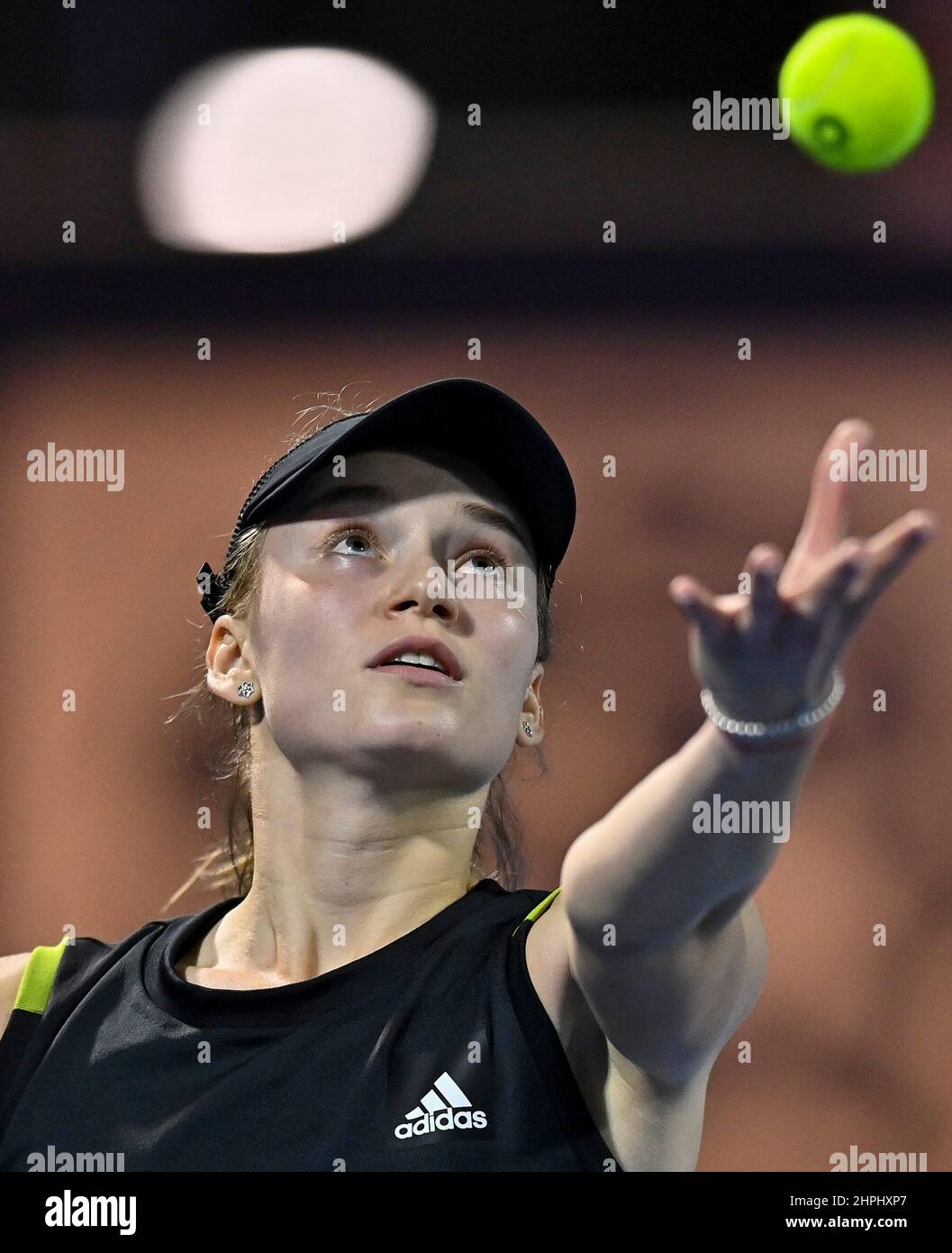 Doha, Qatar. 21st Feb, 2022. Elena Rybakina of Kazakistan serves during the first round of WTA Qatar Open tennis tournament match against Jaqueline Cristian of Romania at the Khalifa International Tennis Complex in Doha, capital of Qatar, on Feb. 21, 2022. Credit: Nikku/Xinhua/Alamy Live News Stock Photo