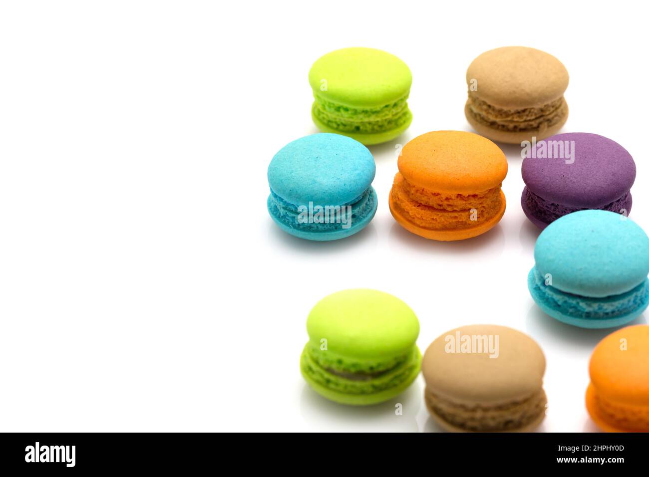 Sweet colourful  macaroons isolated on white background Stock Photo