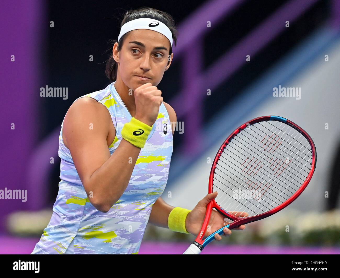 Doha, Qatar. 21st Feb, 2022. Caroline Garcia of France celebrates during  the first round of WTA Qatar Open tennis tournament match against Simona  Halep of Romania at the Khalifa International Tennis Complex