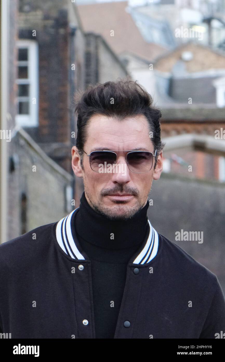 London, UK, 21st Feb, 2022. Model David Gandy poses for photographers outside the Paul & Joe catwalk show venue on day four of London Fashion Week. Credit: Eleventh Hour Photography/Alamy Live News Stock Photo