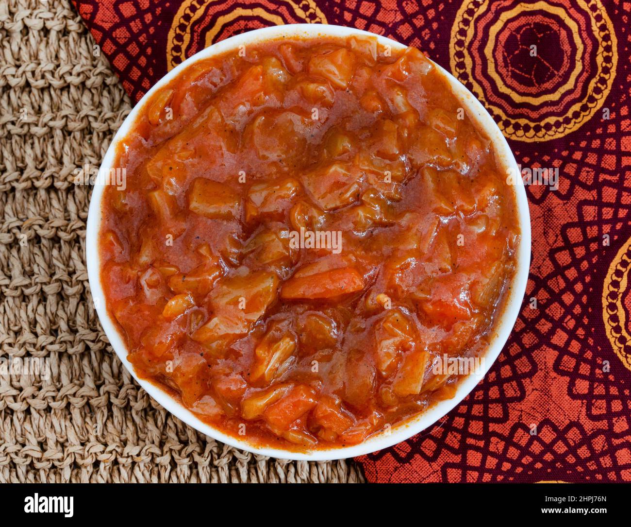 South African vegetable relish or side dish called Chakalaka, originating from townships Stock Photo