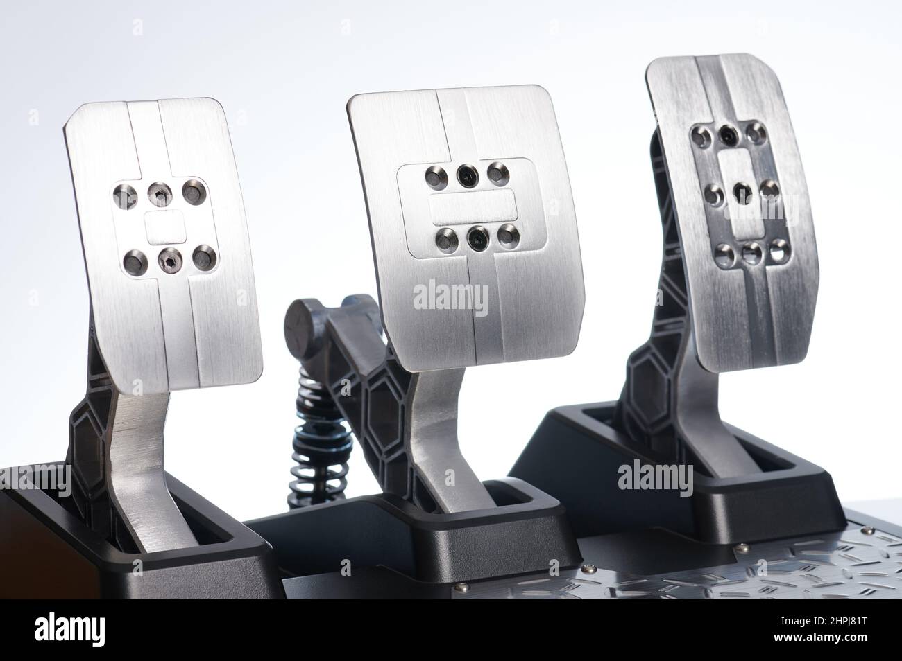 Metal pedals for simulation racing isolated on studio background Stock Photo