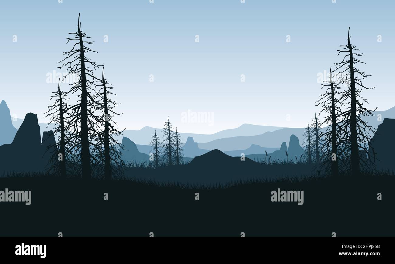 Mountain view with the aesthetic silhouette of dry trees in the morning ...