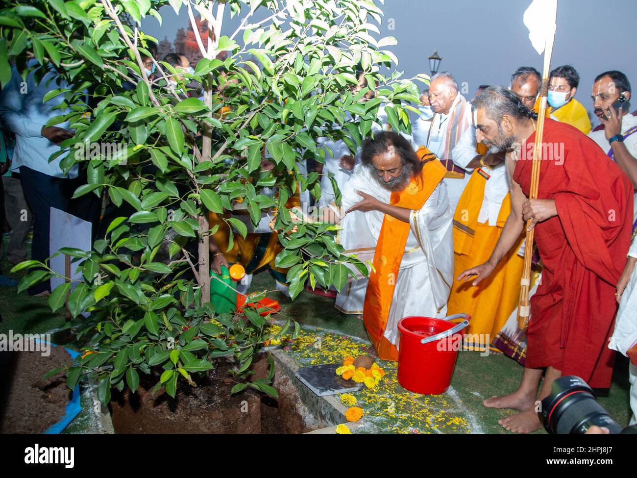Ramanuja Statue of Equality dedication, Sri Sri Ravi Shankar watering tree, Hyderabad, Telengana, India Stock Photo