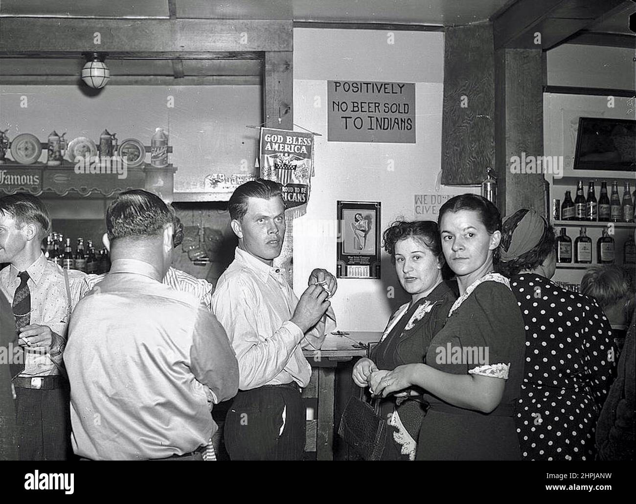 Marion Post Wolcott - Positively No Beer Sold to Indians - Signage in Birney, Montana bar - 1941 Stock Photo