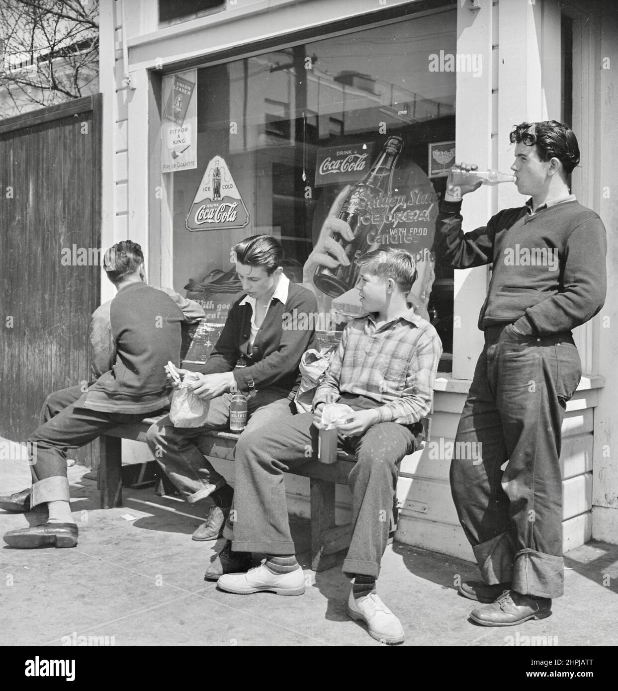 Rondal Partridge - General store with local youths spending their lunch money - 1940 Stock Photo