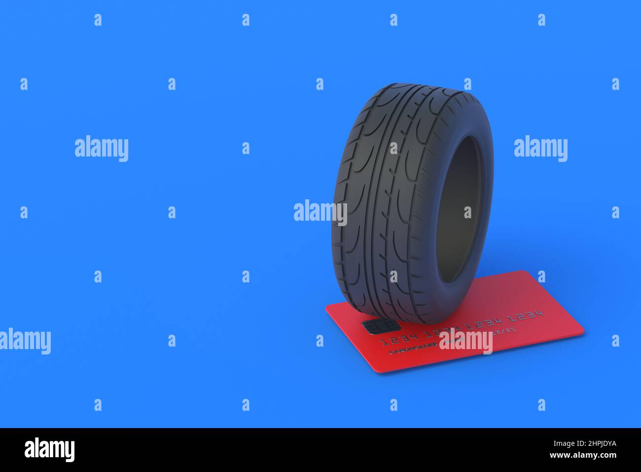 Tire near a credit card. The cost of replacing car wheels. Purchase