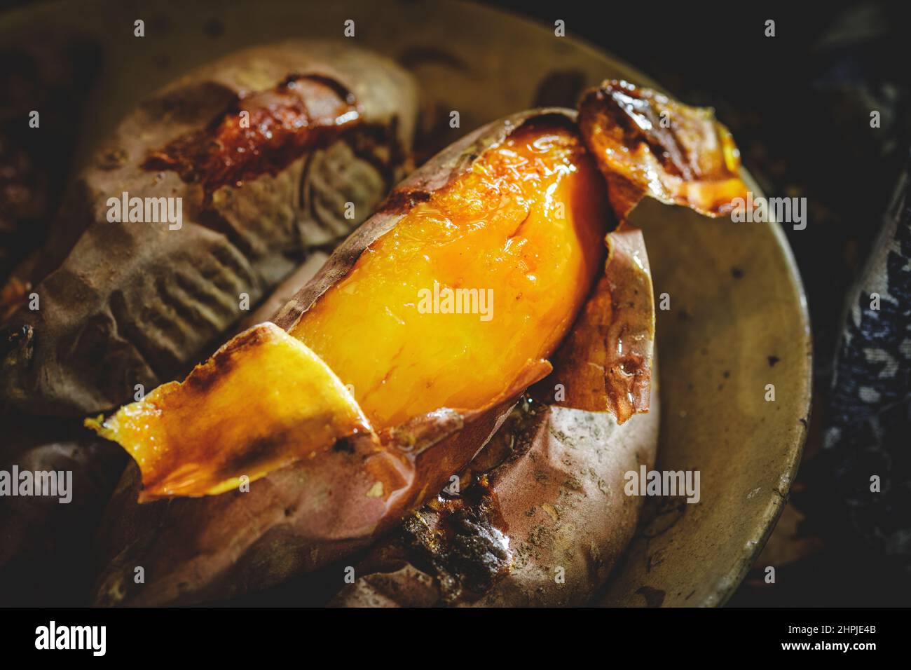 Roast sweet potato Stock Photo - Alamy