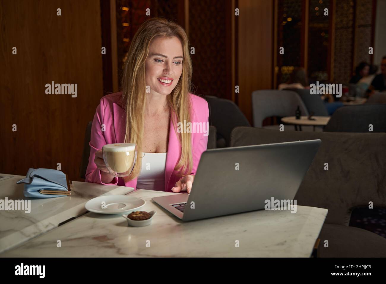Excited well dressed woman hi-res stock photography and images - Alamy