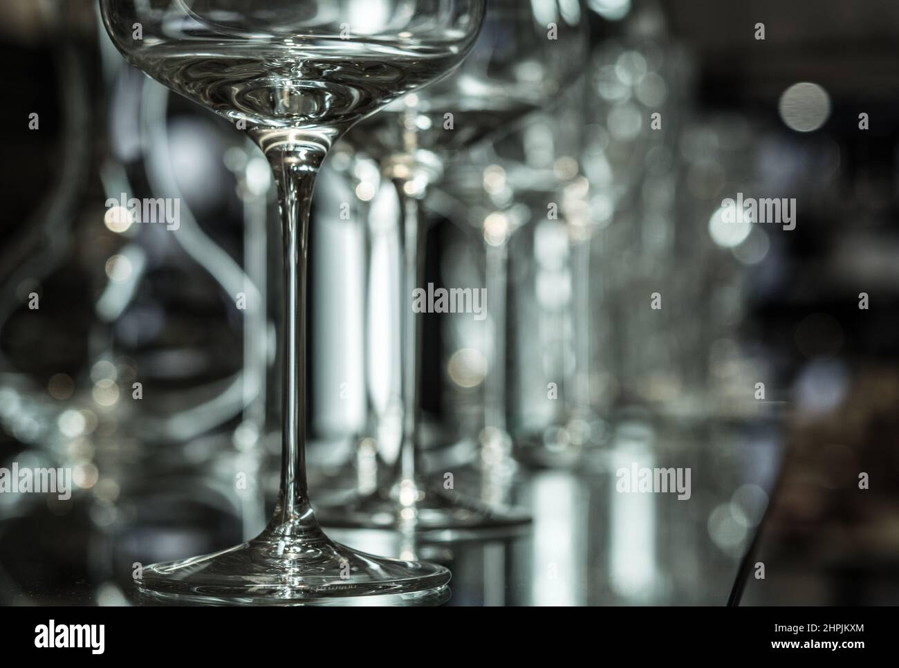 beautiful wine glasses in front of dark background Stock Photo