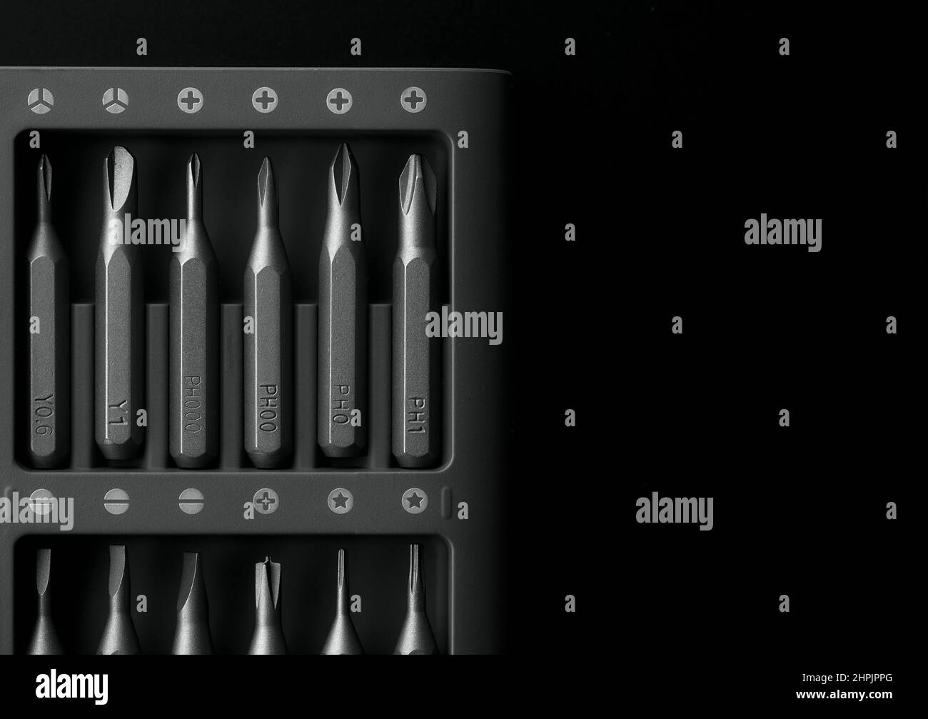 Screwdriver tips different shapes and sizes close up. Manual metal mini
