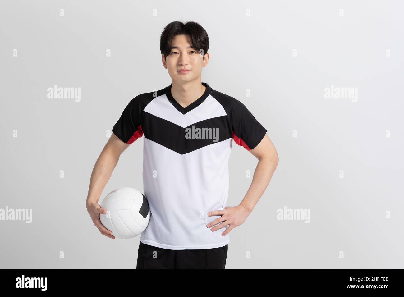 volleyball sports player, asian korean man holding ball Stock Photo Alamy