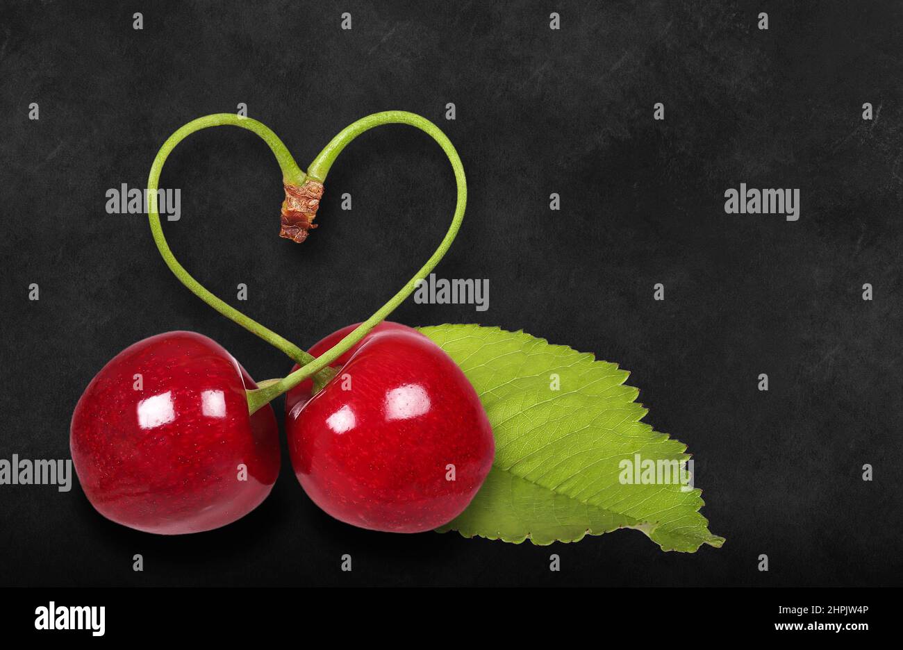 Heart cherries with leaf, heart shape Stock Photo
