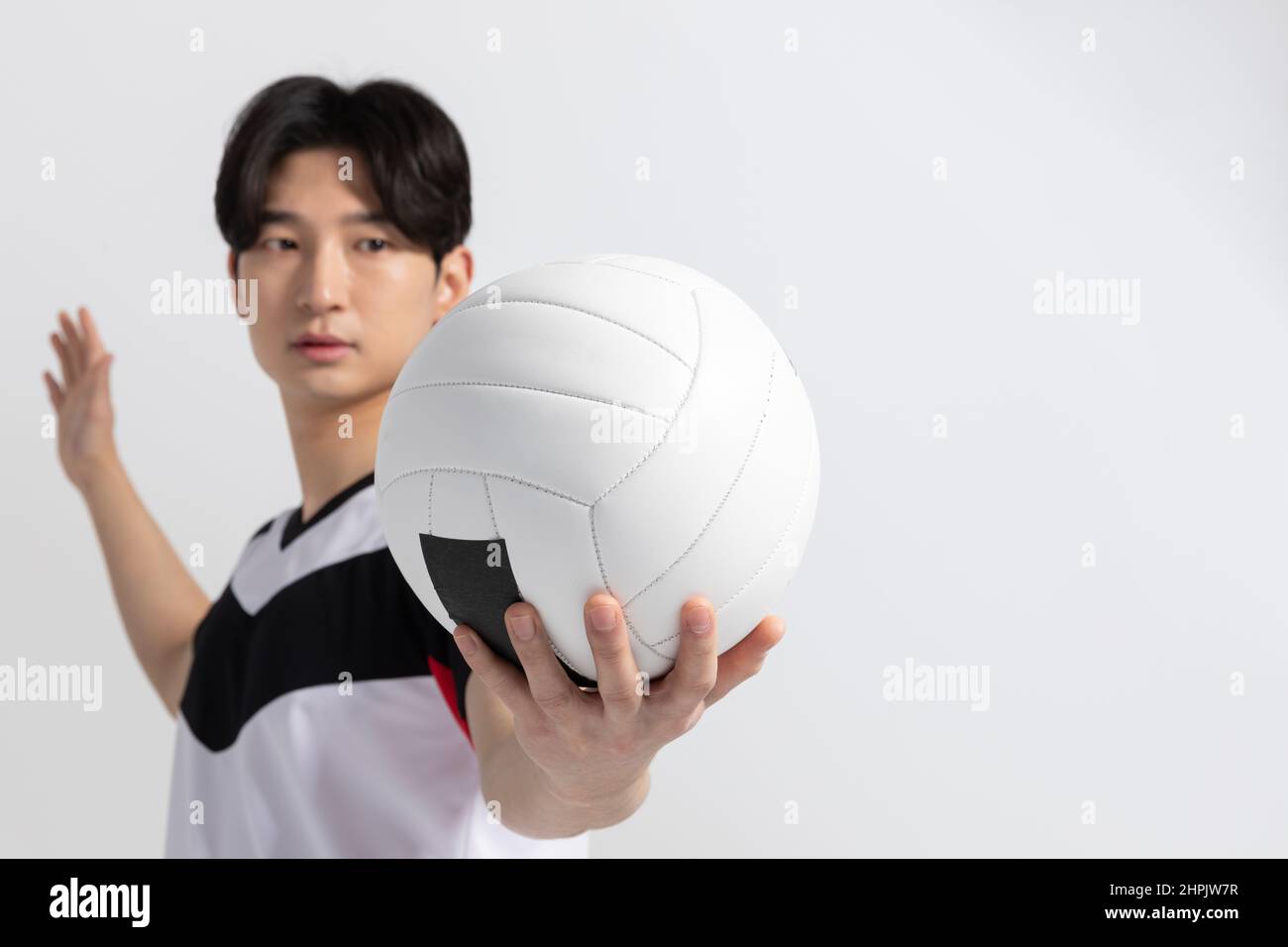 volleyball sports player, asian korean man holding ball Stock Photo Alamy