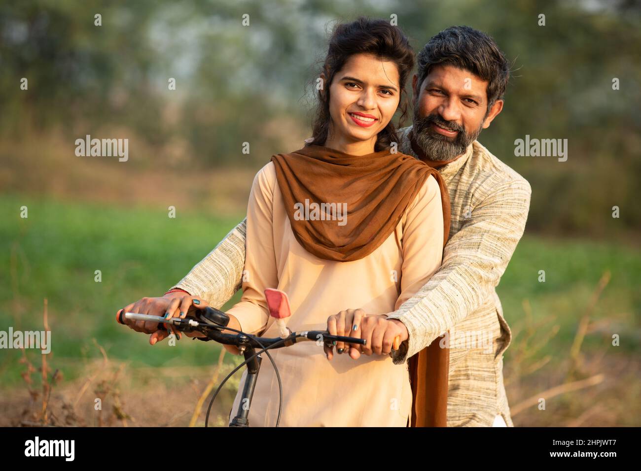 Indian rural family cycle hi-res stock photography and images - Alamy