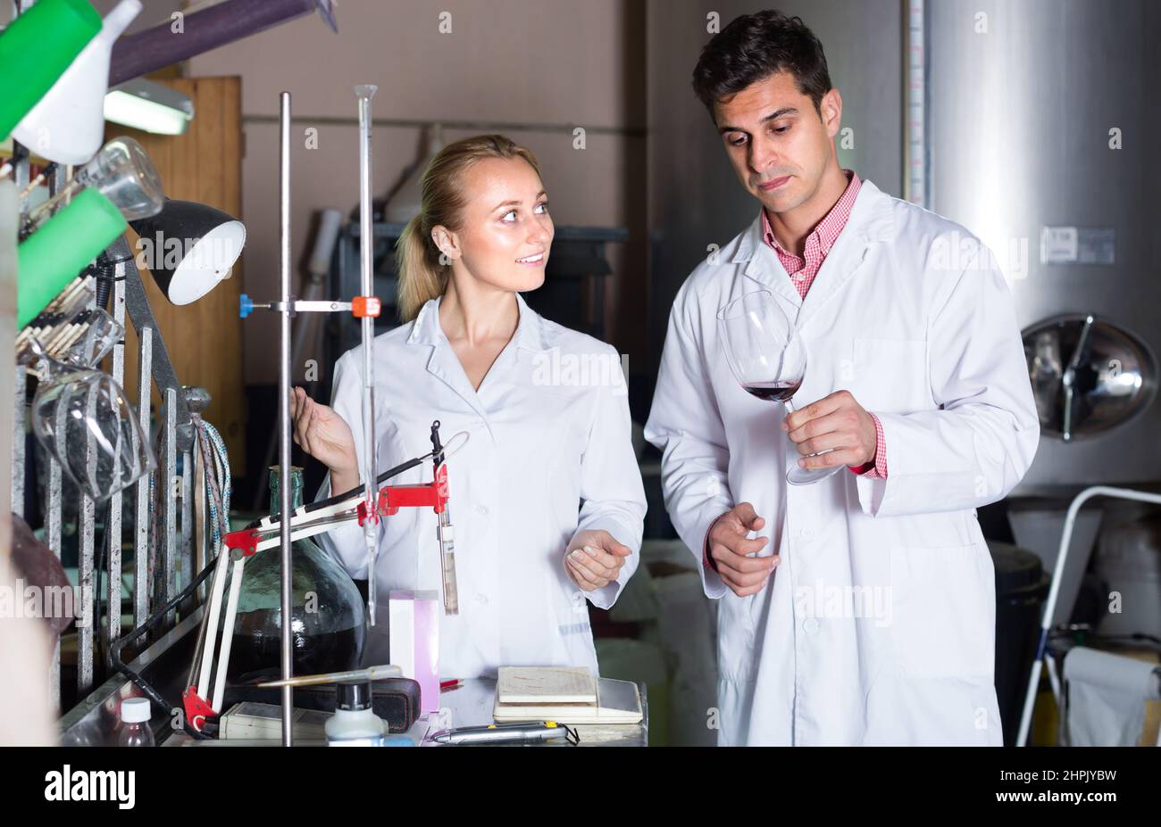 Two laboratory technicians at wine factory Stock Photo Alamy