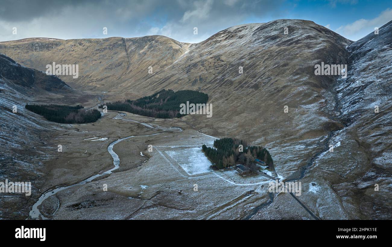 Aerial shot from a drone of Glen Doll with a dusting of snow on a bright February day. East side with snow, west side without. Stock Photo