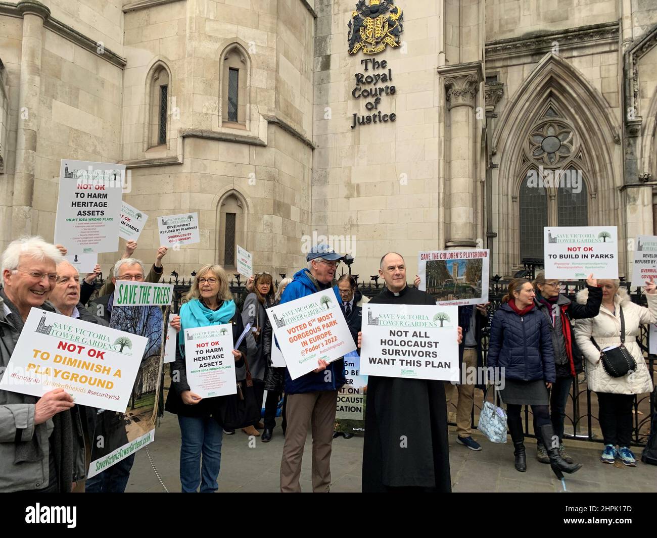 Protesters outside the Royal Courts of Justice in central London ahead of a hearing regarding the UK Holocaust Memorial. The London Historic Parks and Gardens Trust is opposed to a new UK Holocaust Memorial and Learning Centre being built in Victoria Tower Gardens, a small triangular Grade II-listed park next to Westminster Abbey and the Palace of Westminster. Issue date: Tuesday February 22, 2022. Stock Photo