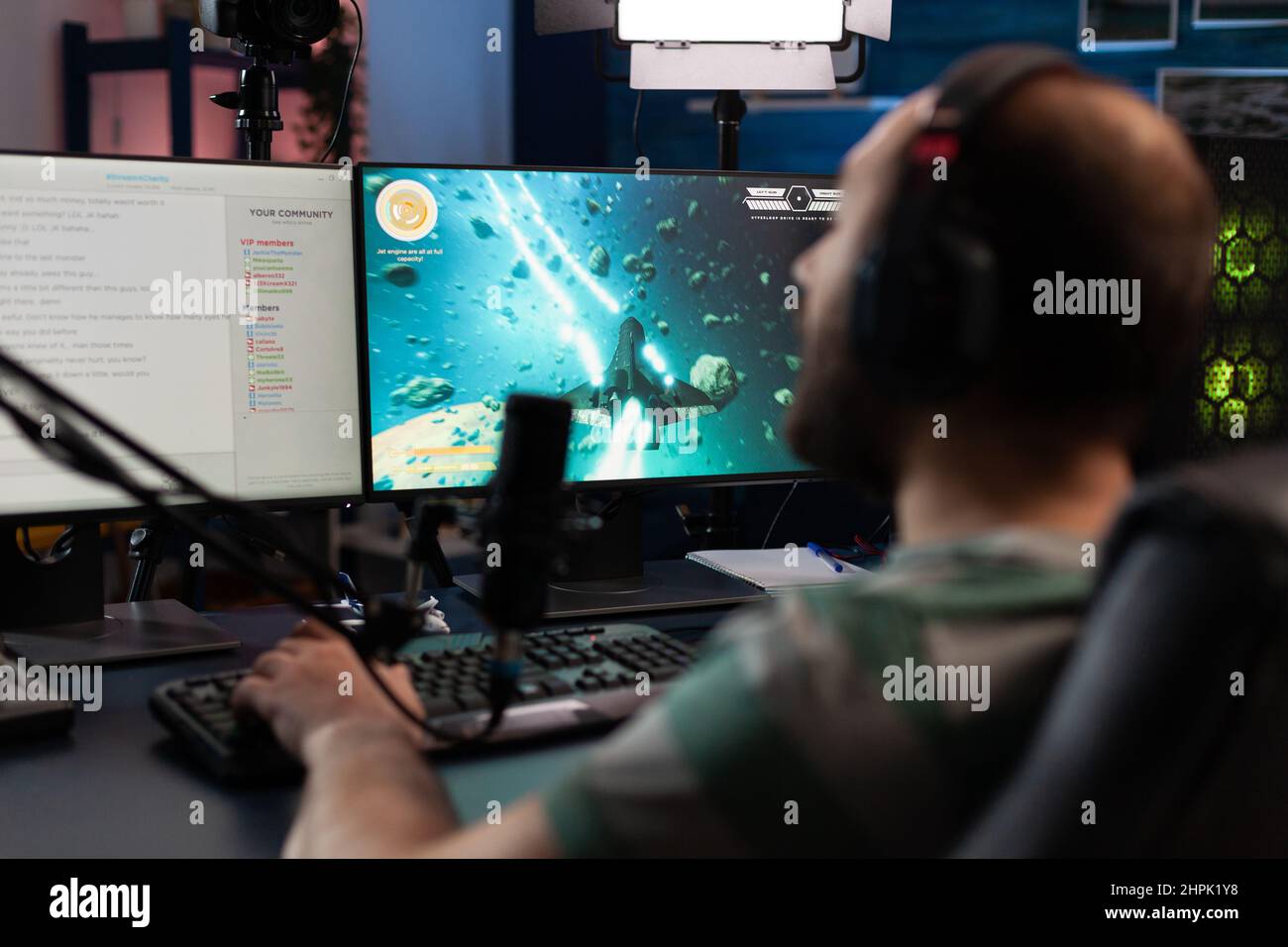 Premium Photo  Happy person live streaming video games tournament online  with multiple players, playing action esport game on computer. male  streamer with headset enjoying gaming competition.