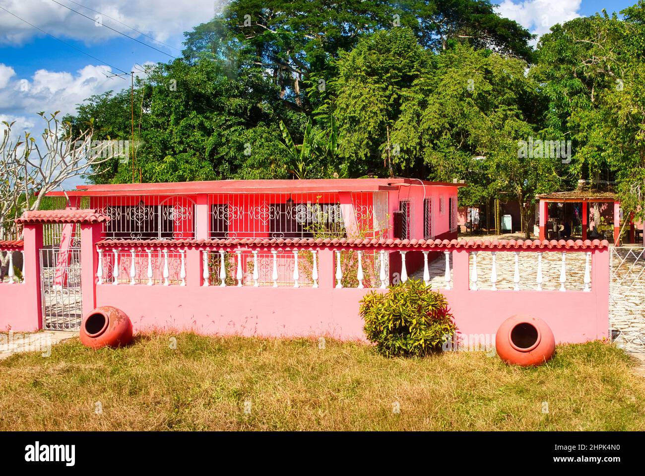 Pink house in rural area, Cuba Stock Photo - Alamy