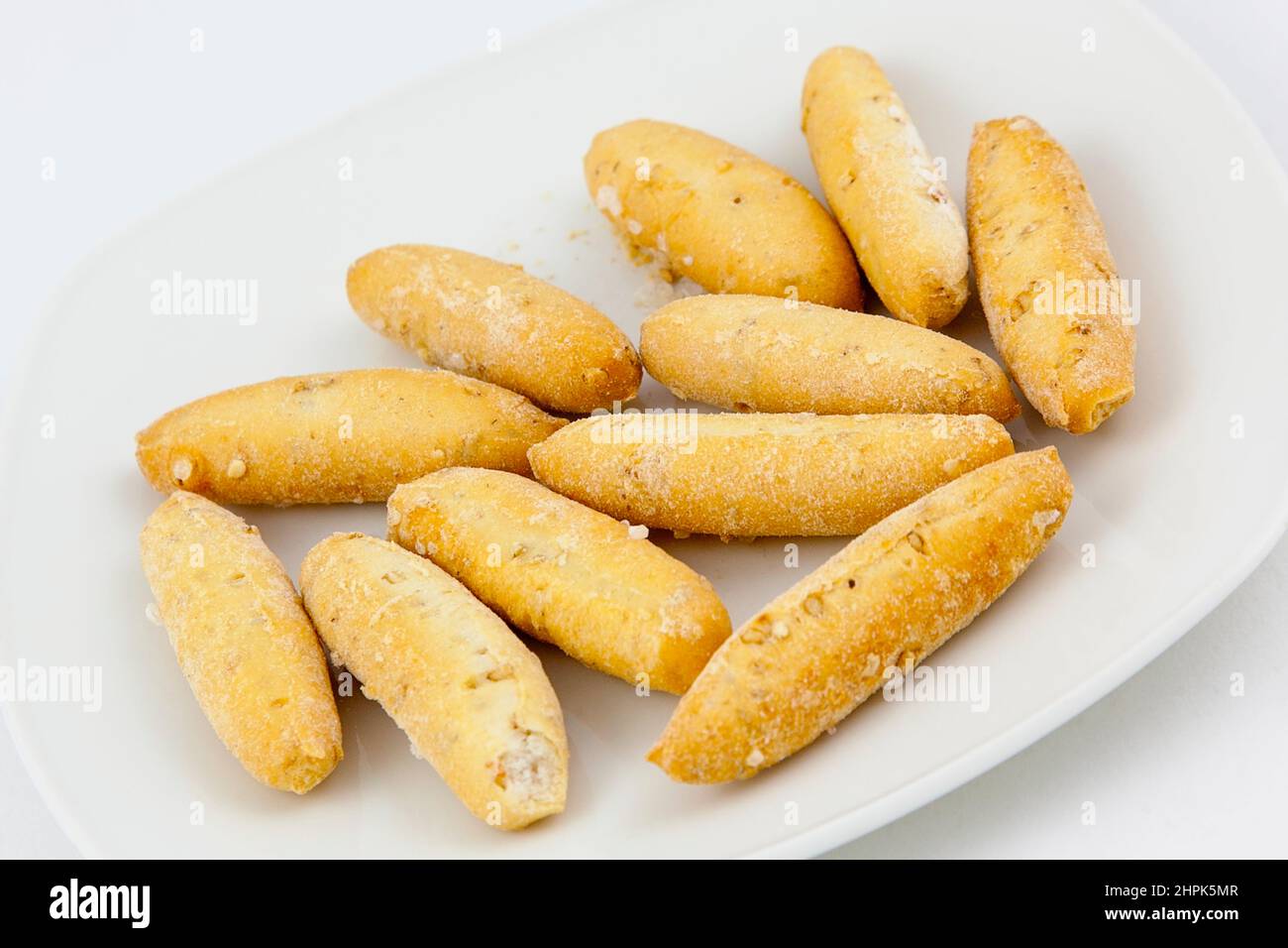 Food, Snacks, Italian Grissini sesame mini bread sticks. Stock Photo