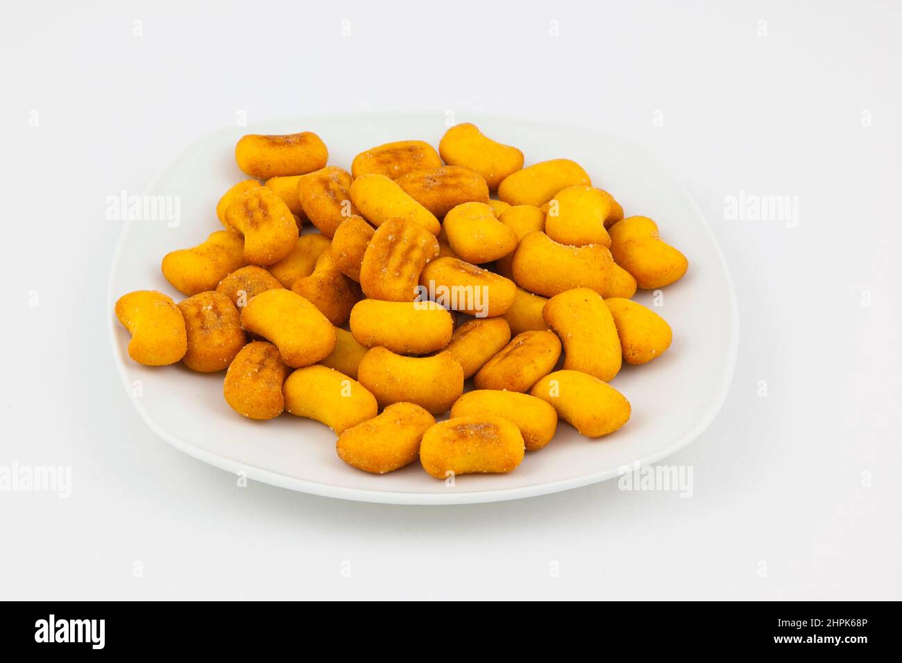 Food, Snacks, Crunchy baked wheat cheese flavoured bitesize shapes. Stock Photo