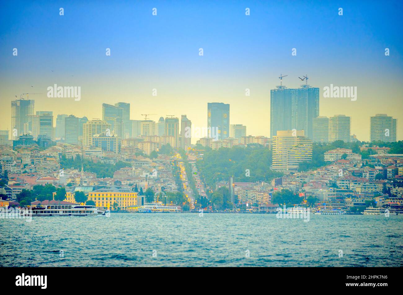 view of the modern part of the city of Istanbul from the strait of the bosphorus, at sunset Stock Photo