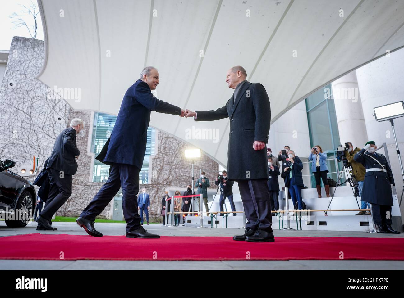 Berlin, Germany. 22nd Feb, 2022. German Chancellor Olaf Scholz (SPD, r) receives Micheál Martin, Prime Minister of Ireland, with military honors in front of the Federal Chancellery. Credit: Kay Nietfeld/dpa/Alamy Live News Stock Photo