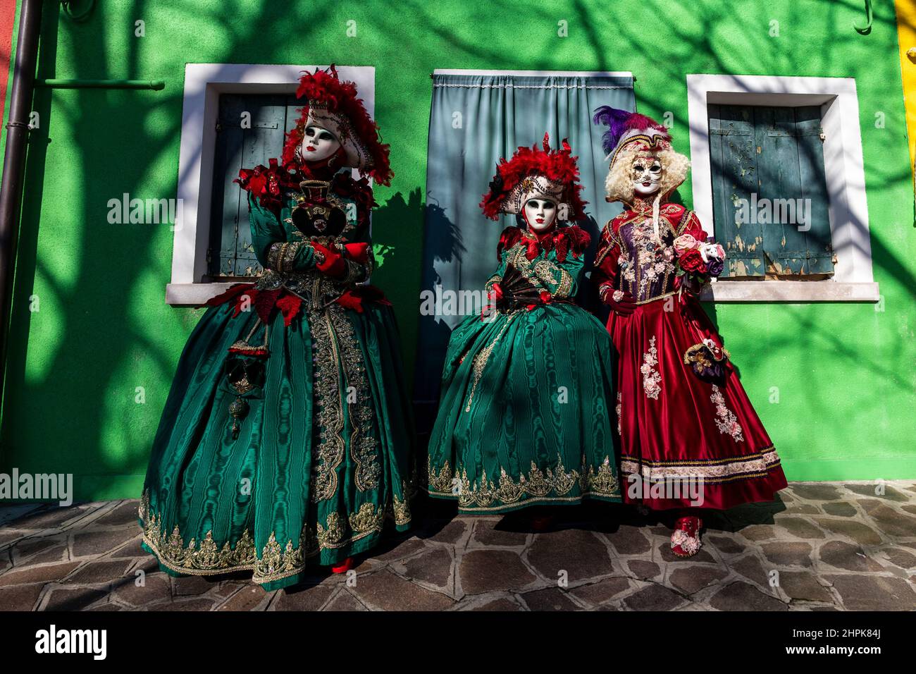 Burano, Venice, Italy. 22 February 2022. Colourful carnival costumes on the Venetian island of Burano during the Carnival in Venice. Credit: Vibrant Pictures/Alamy Live News Stock Photo