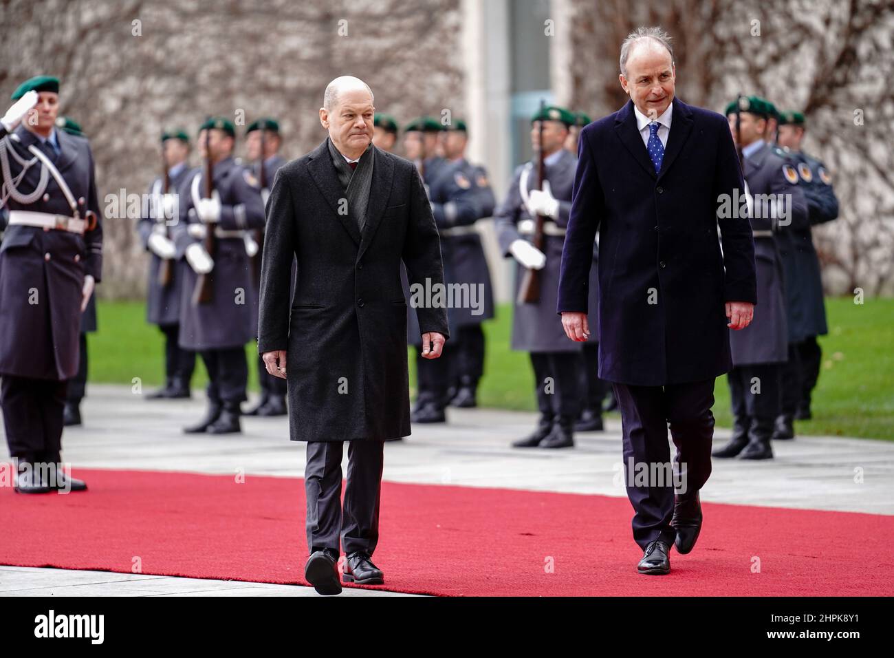 Berlin, Germany. 22nd Feb, 2022. Chancellor Olaf Scholz (SPD) receives Micheál Martin, Prime Minister of Ireland, with military honors in front of the Federal Chancellery. Credit: Kay Nietfeld/dpa/Alamy Live News Stock Photo