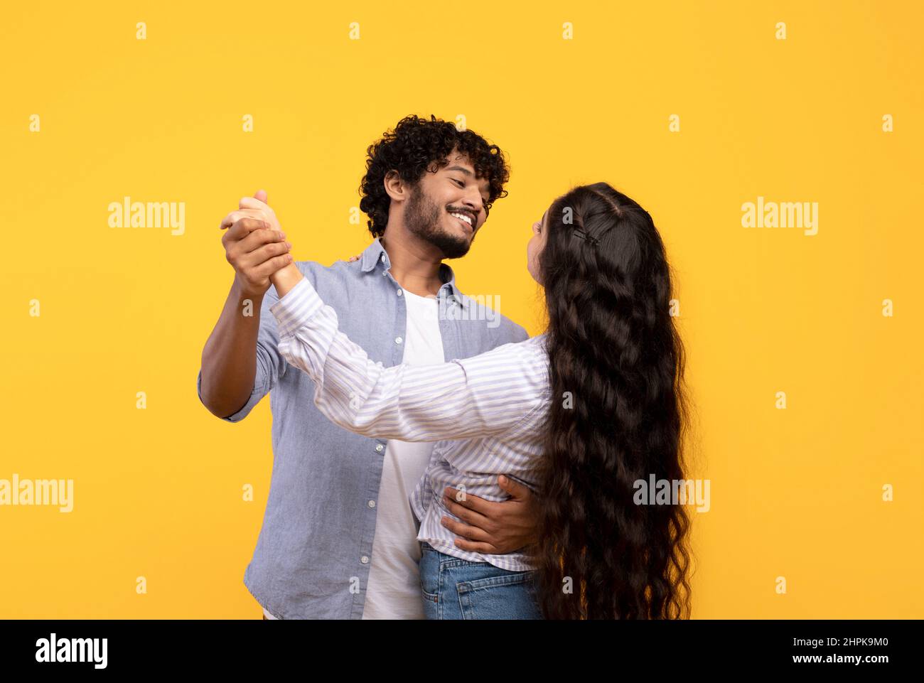 Indian couple holding hands hi-res stock photography and images - Alamy