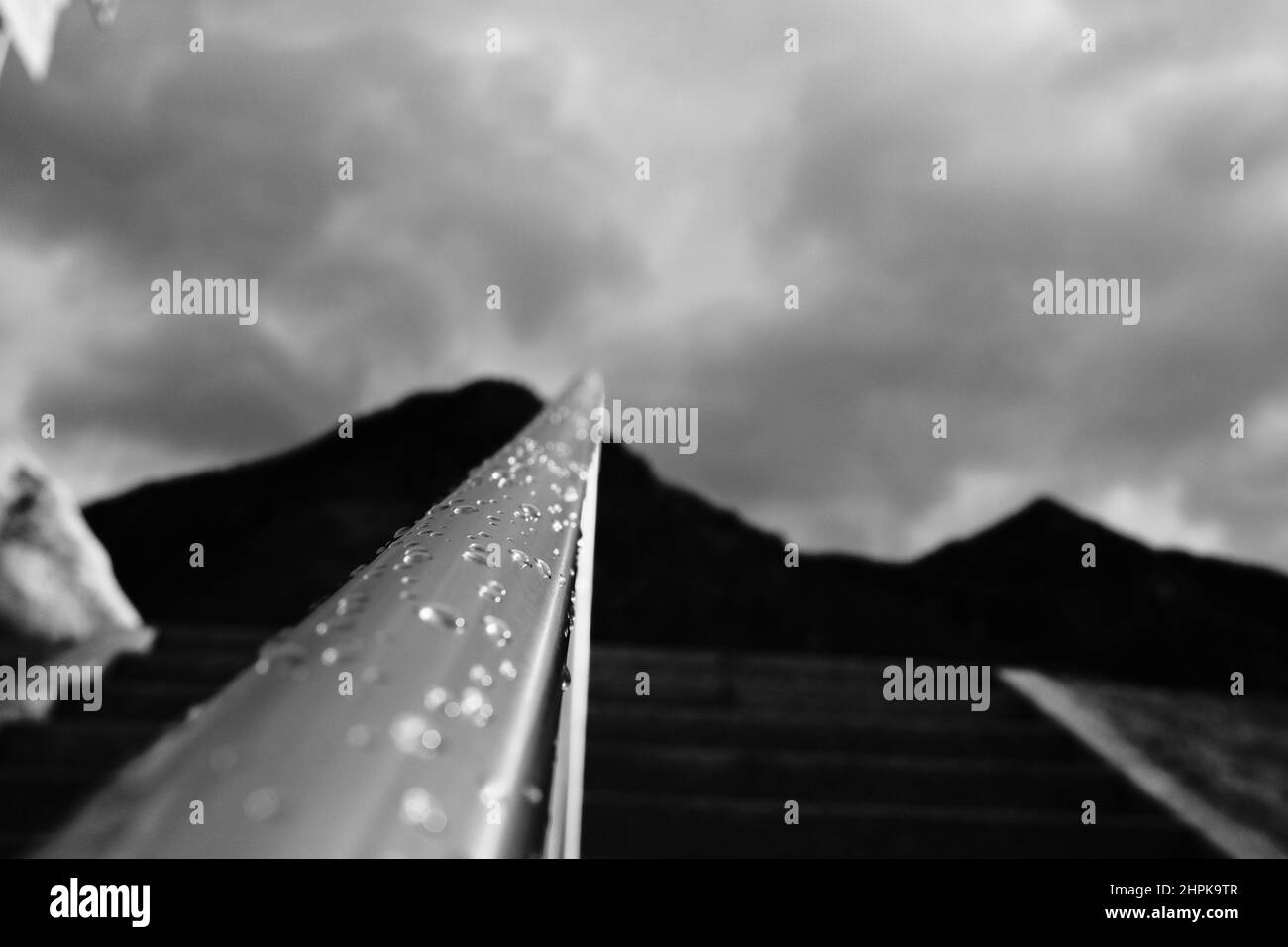 Water Droplets on a Railing Stock Photo - Alamy