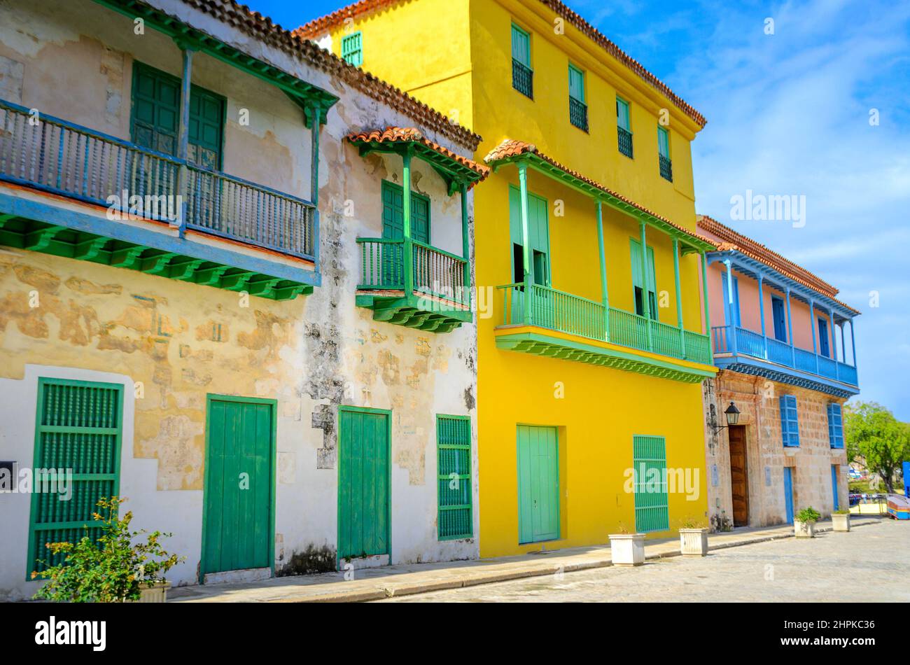 bright, saturated fosada houses in Cuban cities, on a bright sunny day Stock Photo