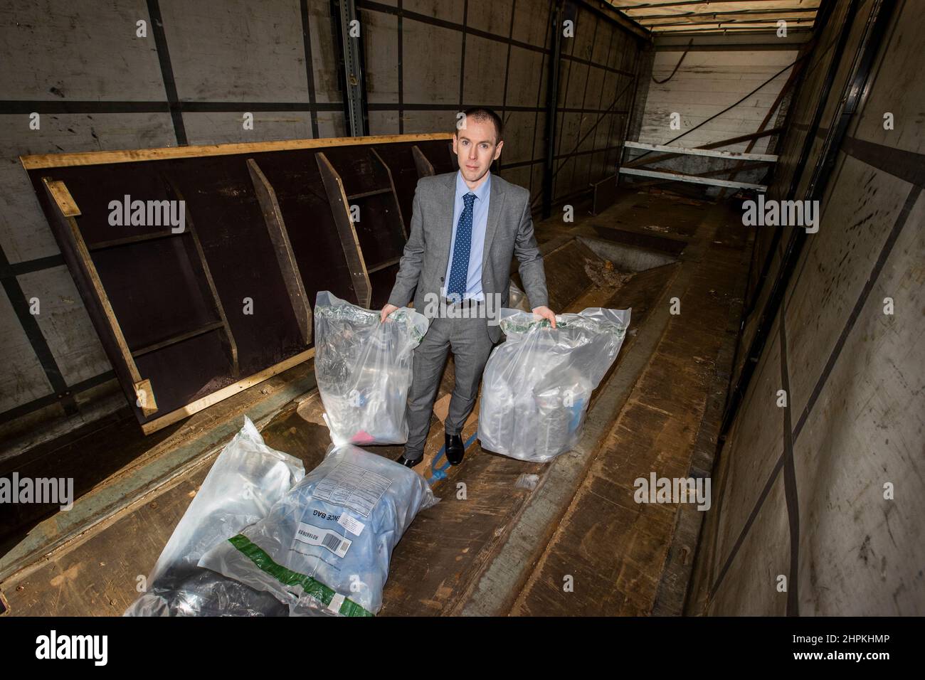 Police Service of Northern Ireland (PSNI) Detective Inspector Conor Sweeney of the Organised Crime Task Force at a location in Greater Belfast, showing part of a £3 million drug seizure that was intercepted at Belfast Harbour. The find is one of Northern Ireland's largest recorded. Stock Photo