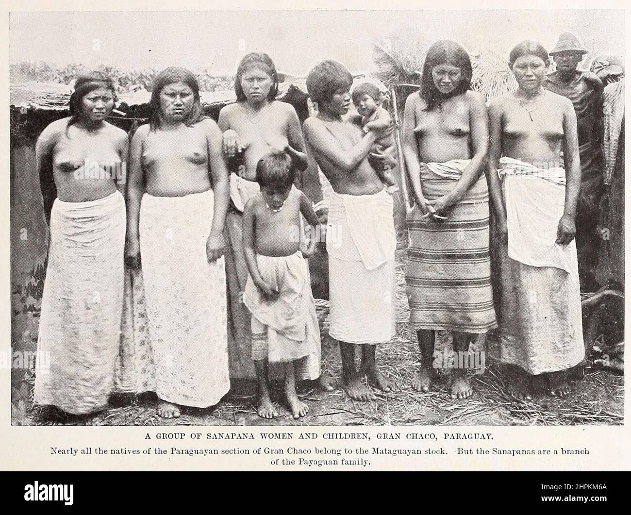 GROUP OF SANAPANA WOMEN AND CHILDREN, GRAN CHACO, PARAGUAY from the book ' The living races of mankind ' a popular illustrated account of the customs, habits, pursuits, feasts & ceremonies of the races of mankind throughout the world by Sir Harry Hamilton Johnston, and Henry Neville Hutchinson Volume 2 Published in London by Hutchinson & Co. in 1902 Stock Photo