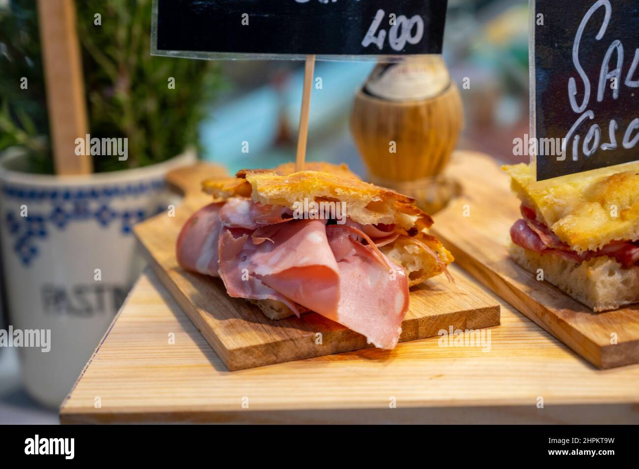 Italian street food, Parma ham sandwiches, bread with cured meats in
