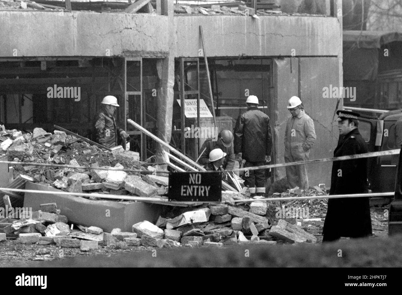 File photo dated 22/02/72 of forensic experts looking through the rubble caused by the bomb explosion which blasted the building at the Aldershot Barracks killing seven people in an IRA bomb. A memorial to mark the bombing of the HQ 16th Independent Parachute Brigade Officers' Mess will be unveiled at Aldershot Barracks, Hampshire, marking the 50th anniversary of the car bomb which was left outside the officers' mess of the 16th Parachute Brigade in Aldershot, killing a Roman Catholic priest serving in the army, a gardener, and five female kitchen staff. The IRA claimed it was in retaliation t Stock Photo