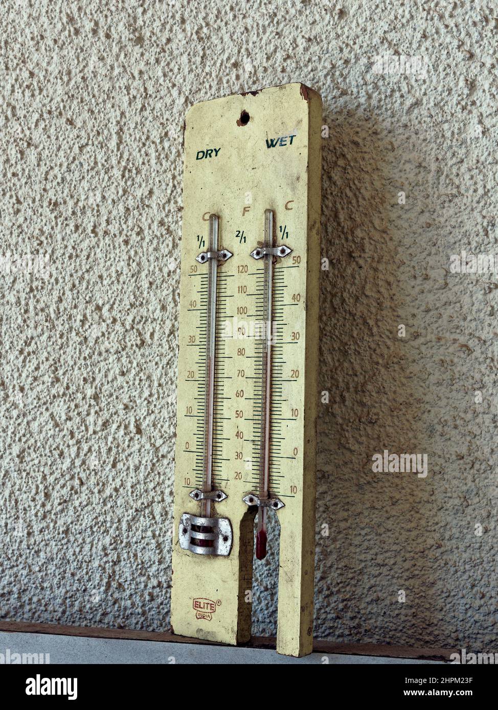 02 20 2022 Vintage wooden Wet-Dry Bulb Hygrometer, Wall Mounted Thermometers Lokgram Kalyan Maharashtra India. Stock Photo