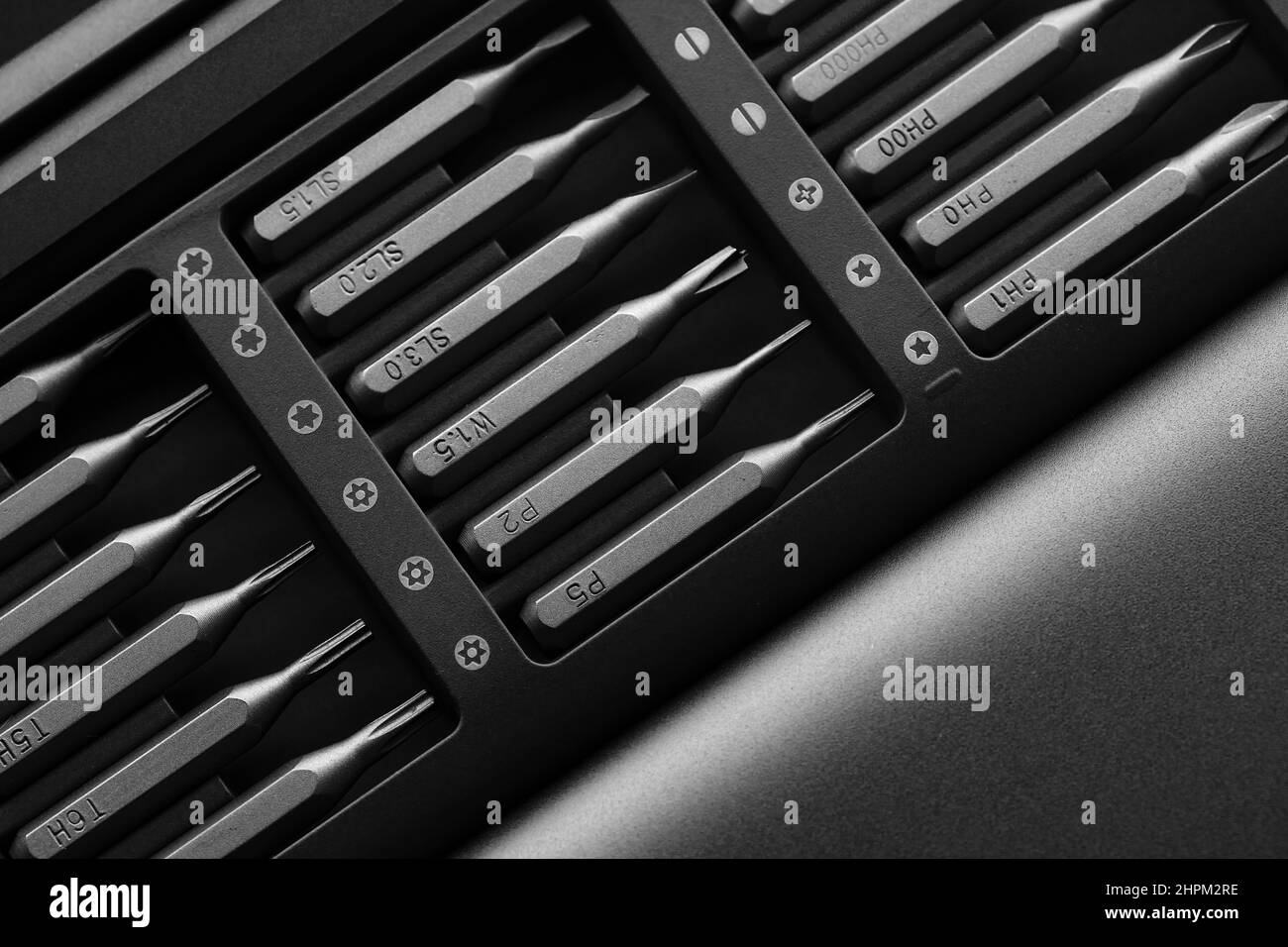 Screwdriver tips different shapes and sizes close up. Manual metal mini