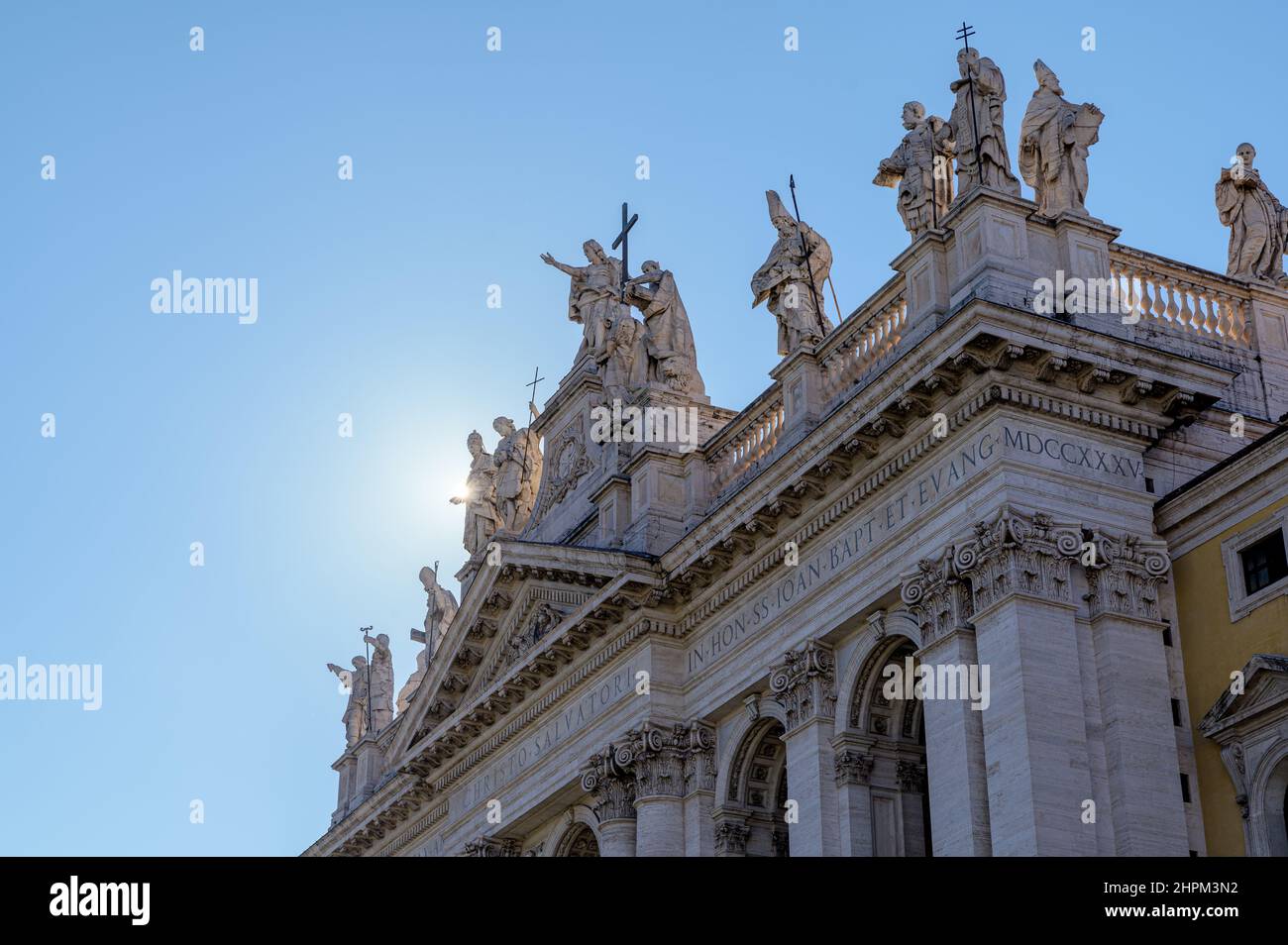 Detail of the sculpted statues of Jesus Christ and Apostles on top of Saint John in Lateran basilica, a main catholic church in Rome, Italy Stock Photo