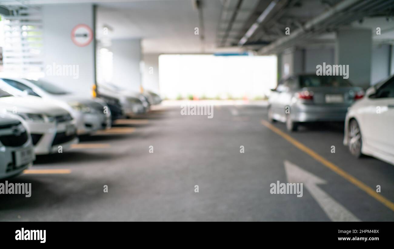 Blurred car parking row indoor supermarket transport business ...