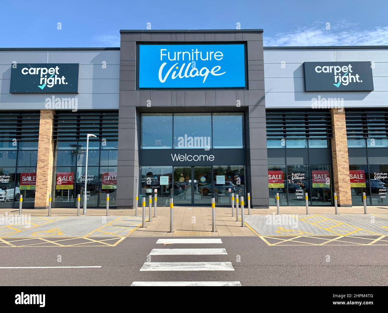 The storefront of Furniture Village and Carpet Right at Clock Tower