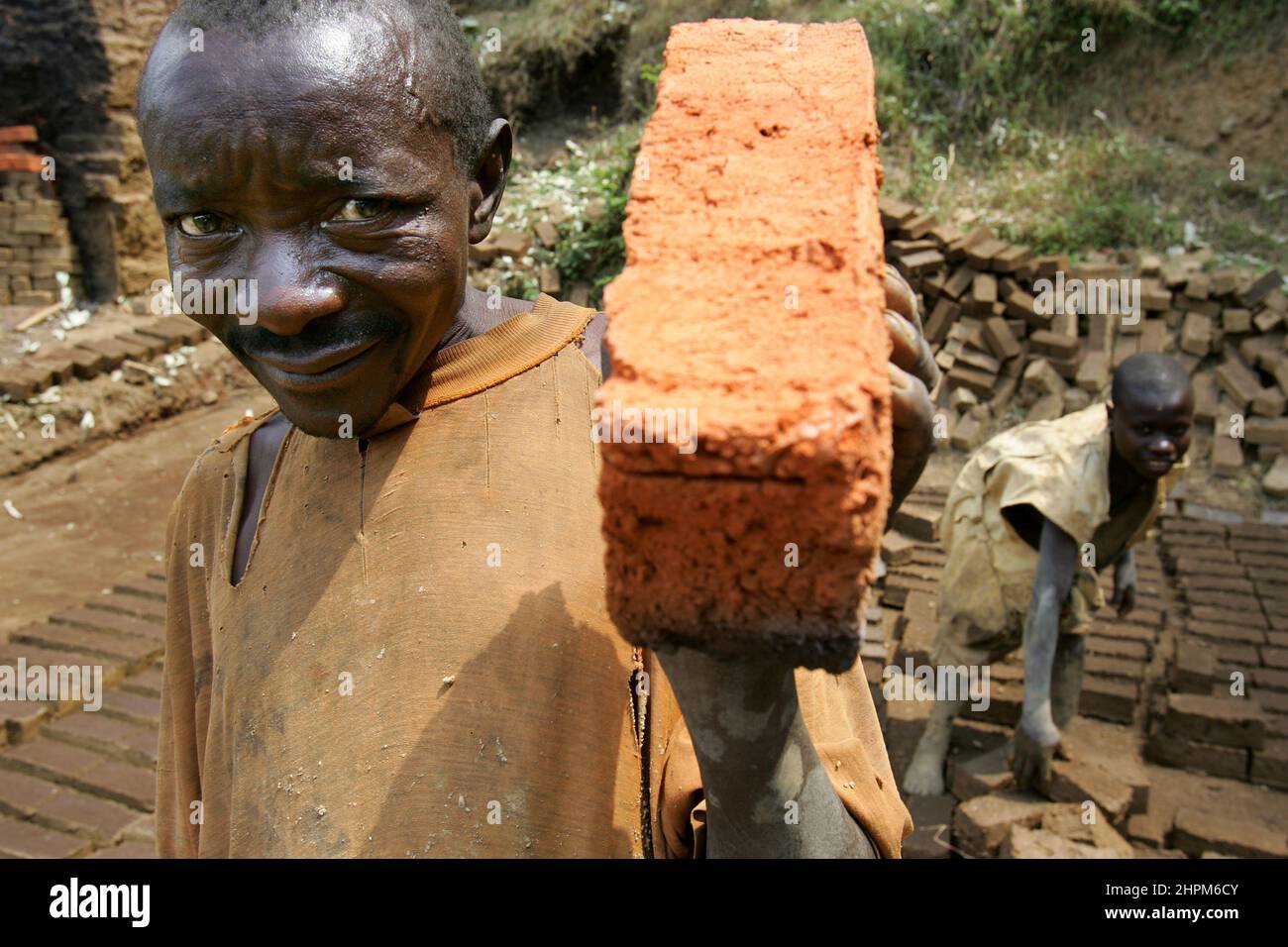 Brick manufacturing at Lake Kivu near Bukavu.  The picture is deceptive, however, as war has been waged in eastern Congo since 1996. Mai Mai warriors and Interahamwer mass murderers from Rwanda have killed over 4 million people. Stock Photo